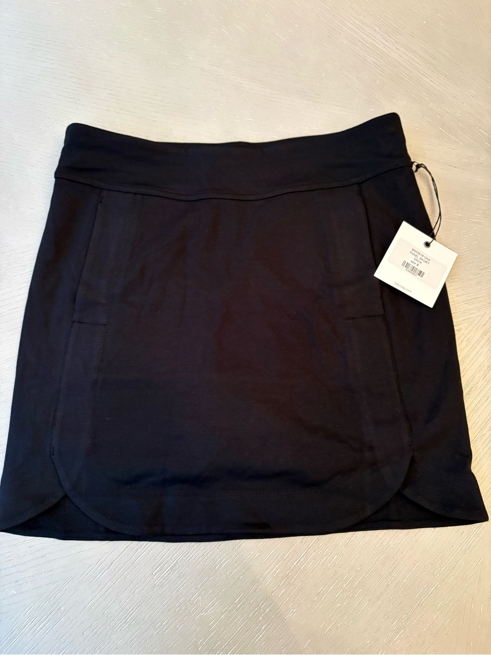 Belyn Key Black Golf Skort with Curved Hem
